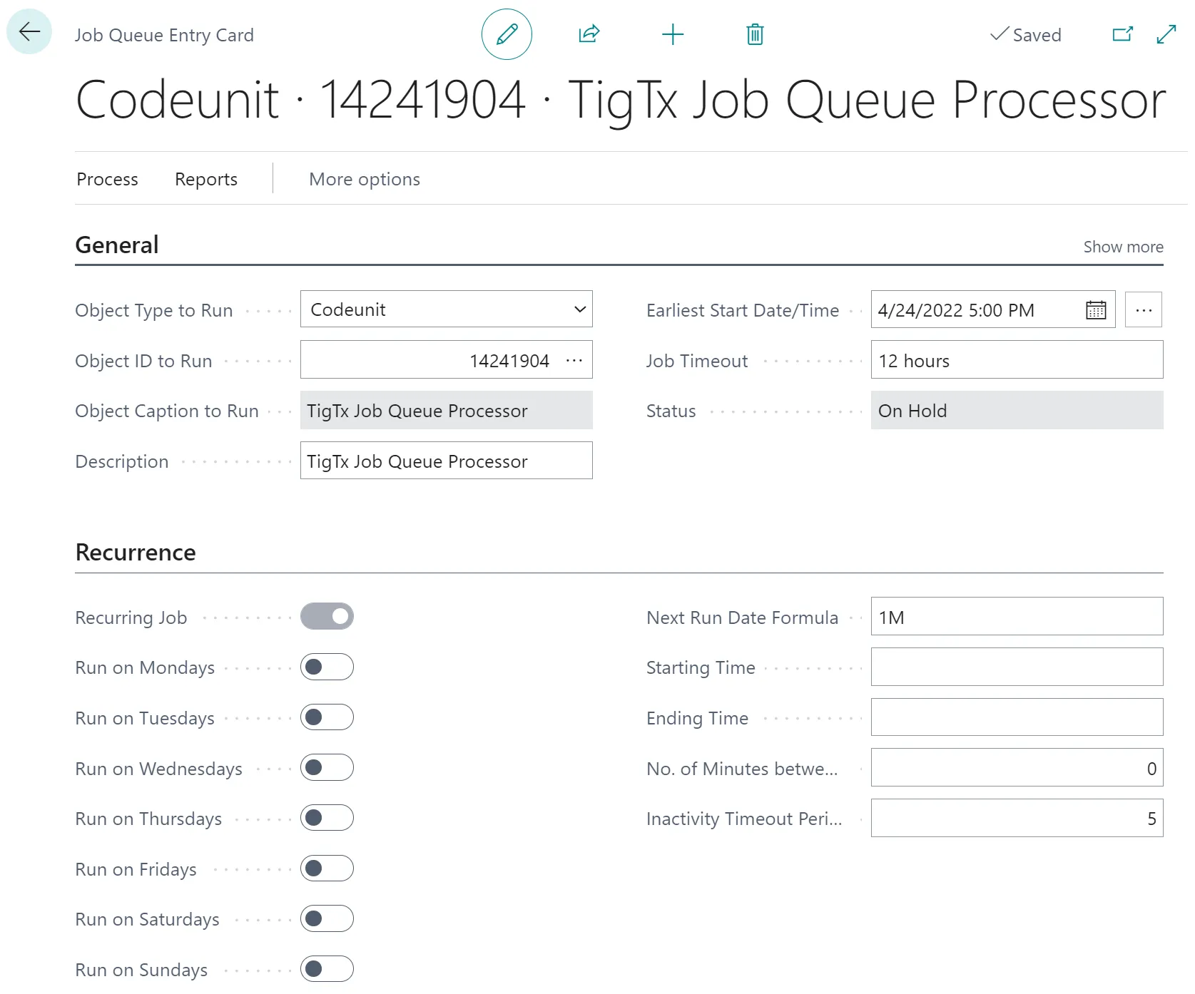 The Job Queue Entry Card for the TigTx Job Queue Processor, with a monthly recurrence and the status On Hold